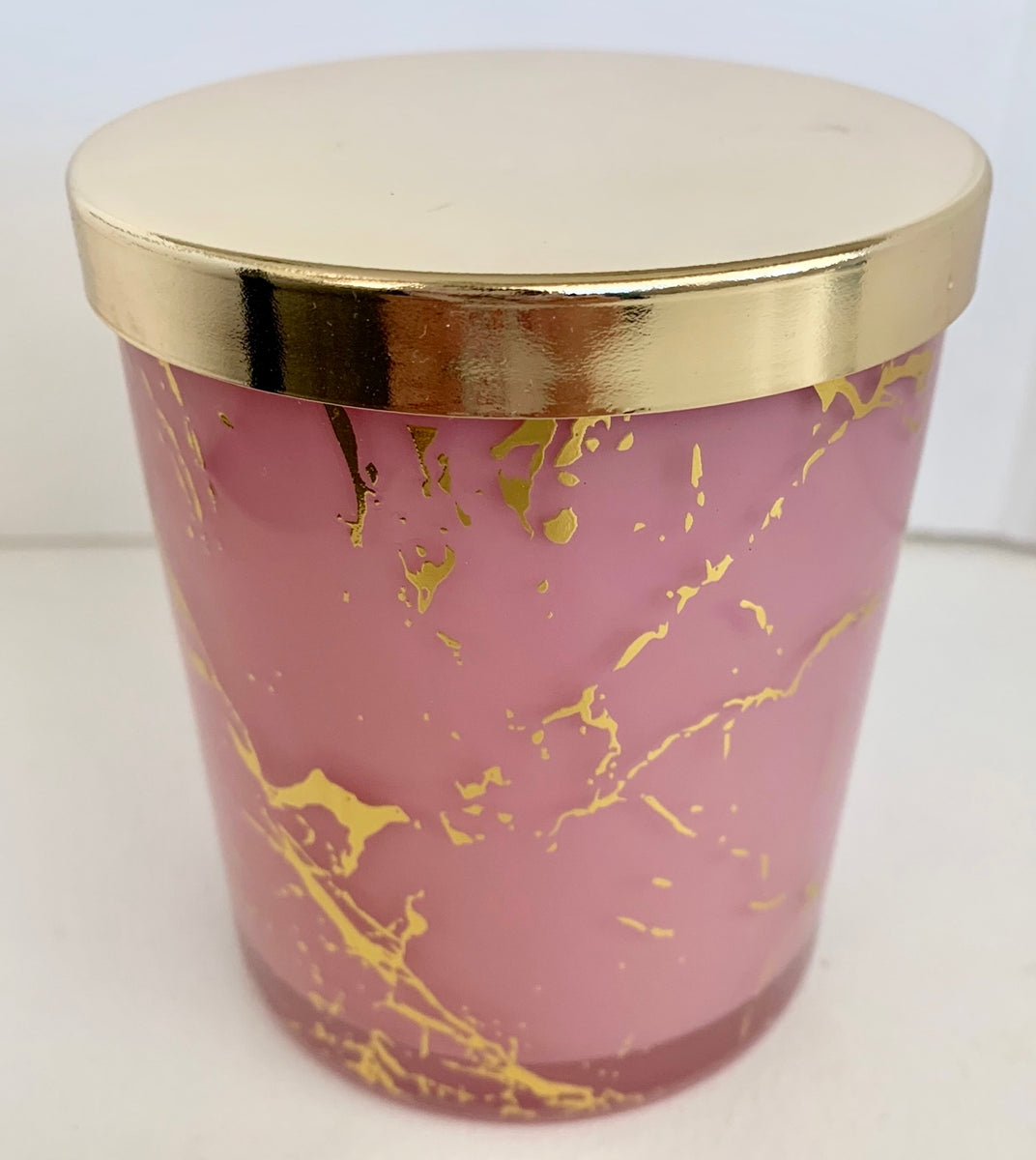 large luxury candle jars deep pink with gold veins running