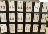 Christmas earrings, comes in a sealed gift bag.