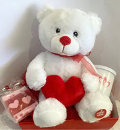 Singing bear with a 300 gm scented soy wax candle and a double heart scented goat’s milk soap. Valentine’s Day gift.